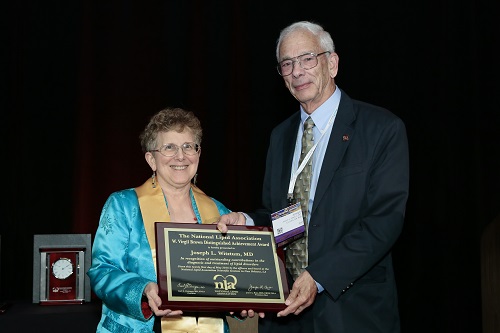Joseph Witztum receives award, presented by Anne Goldberg